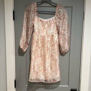 Floral peasant dress. Sheer sleeves. Never worn size xs